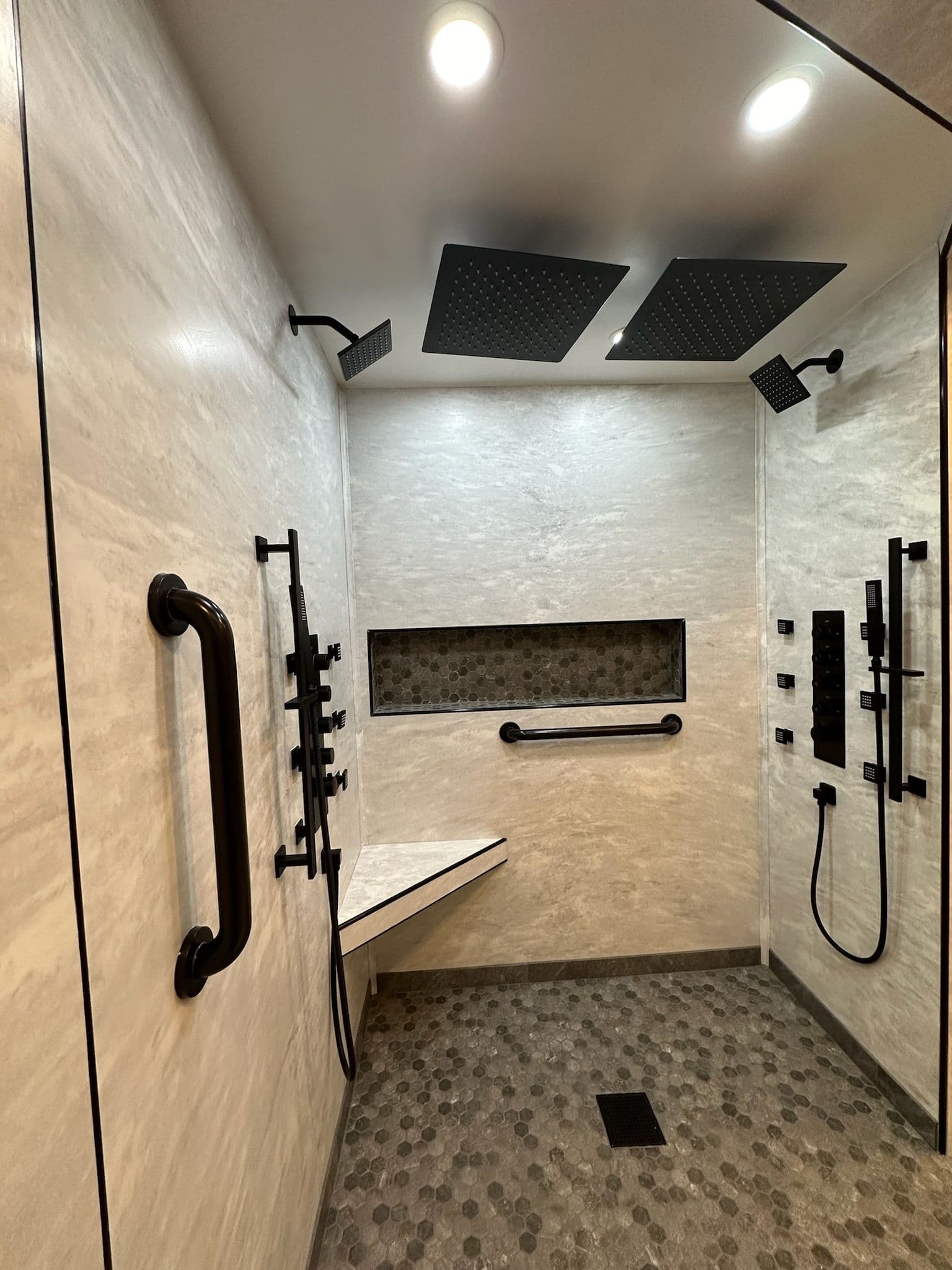 Shower Renovation with Dual Showerheads and Accessibility Features